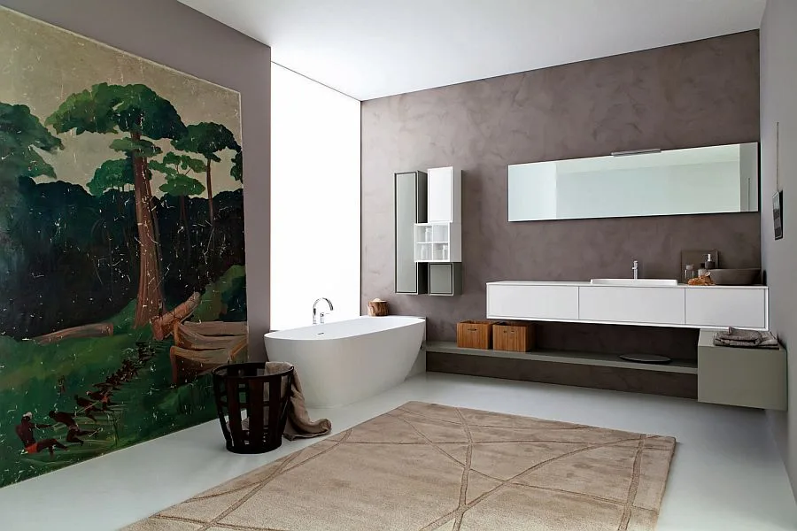 Bathroom with a freestanding tub and a feature wall