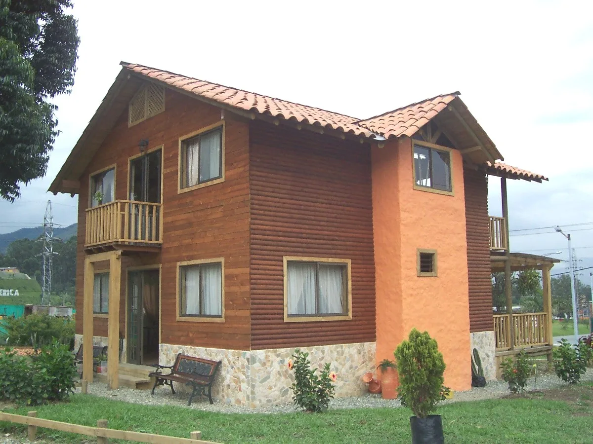 Brick and timber cottage with a balcony