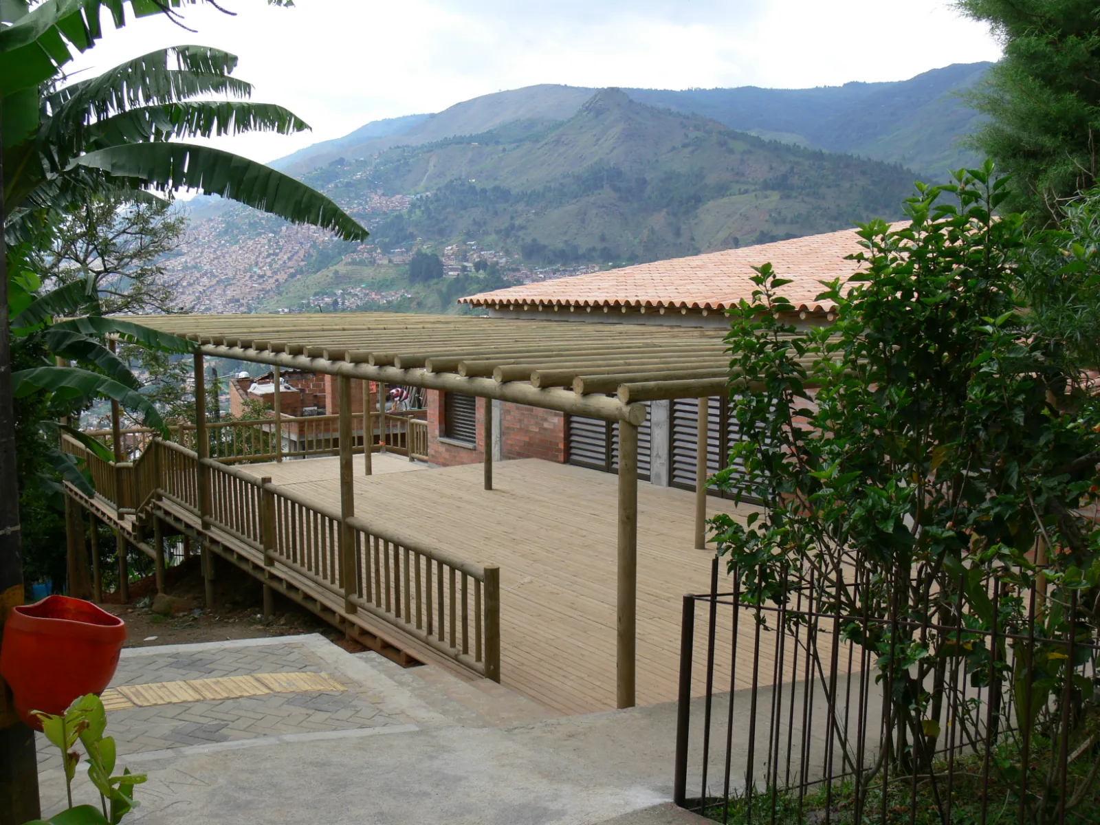 Deck and ramp at a hillside cottage
