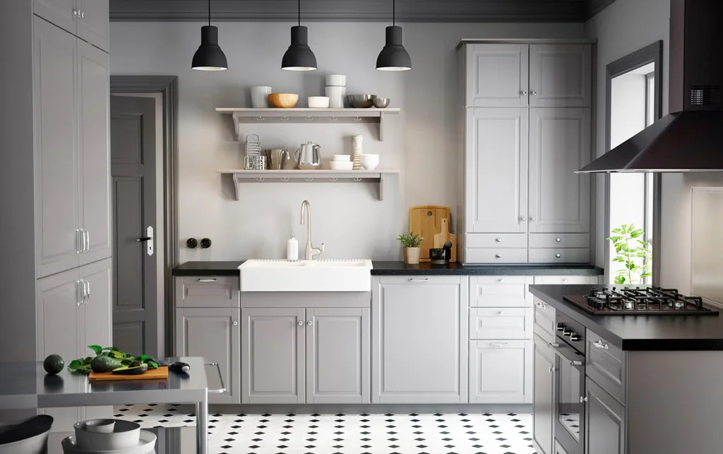 Grey shaker kitchen with a farmhouse sink and open shelves
