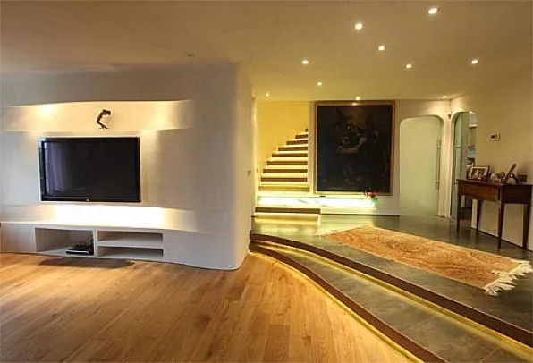 Modern living room with oak flooring and built-in media wall