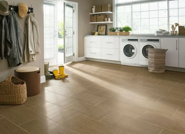 Tiled mudroom and laundry area