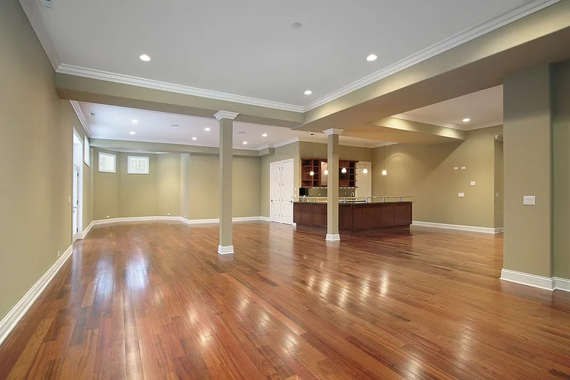 Open-plan room with freshly finished hardwood floors