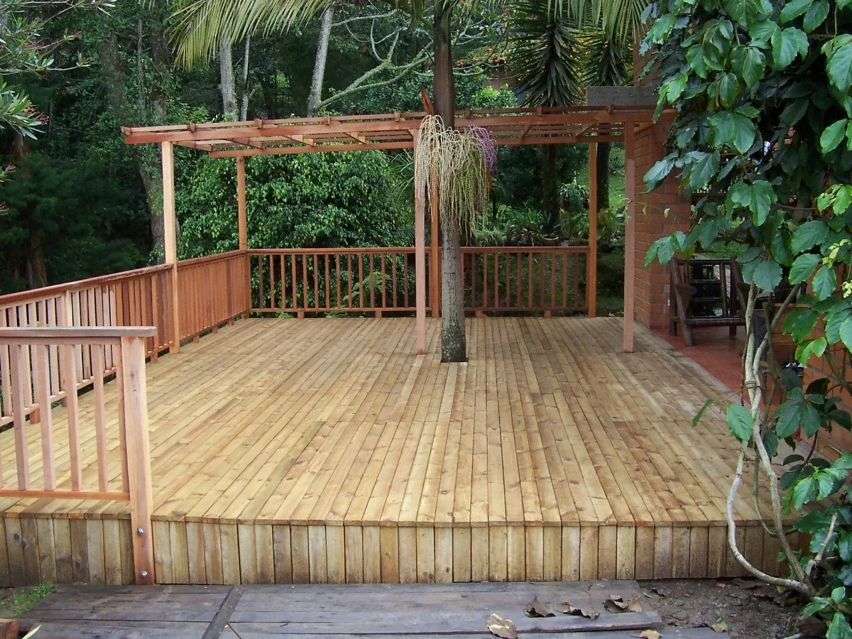 Backyard cedar deck with a pergola